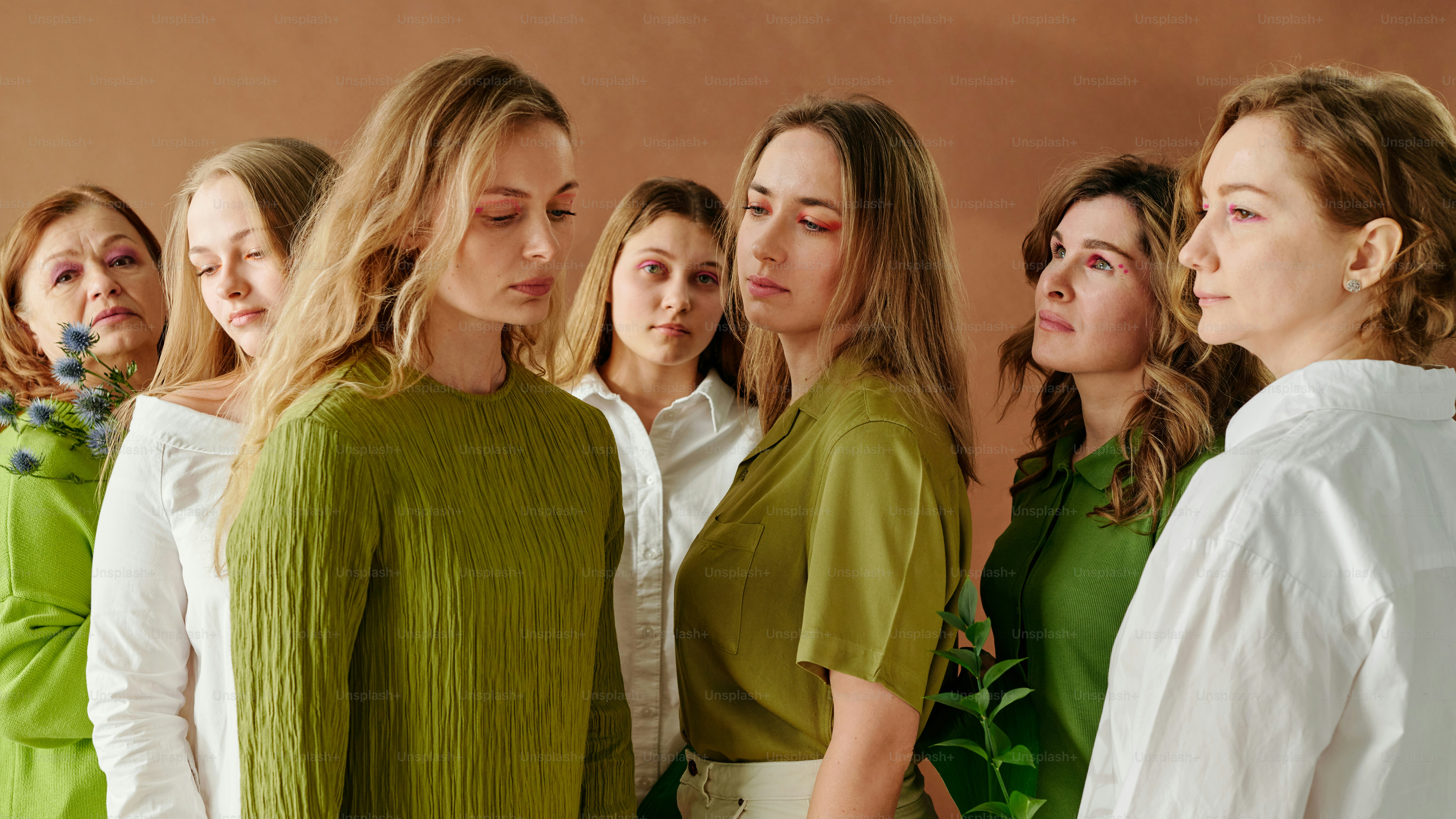 a group of women standing next to each other