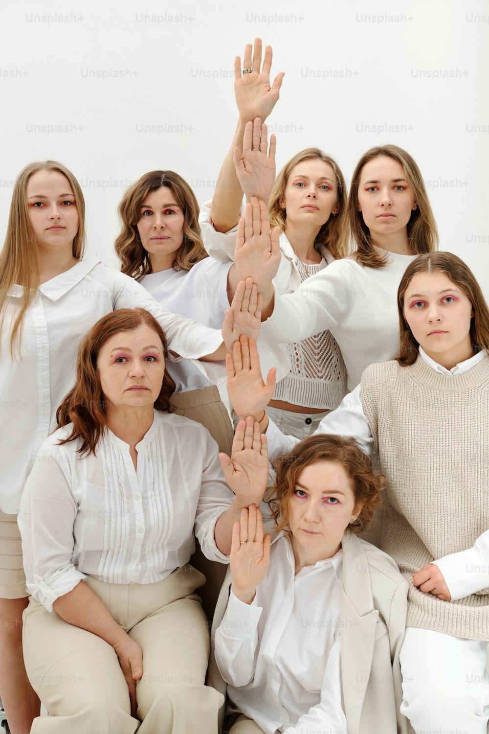 a group of women sitting next to each other