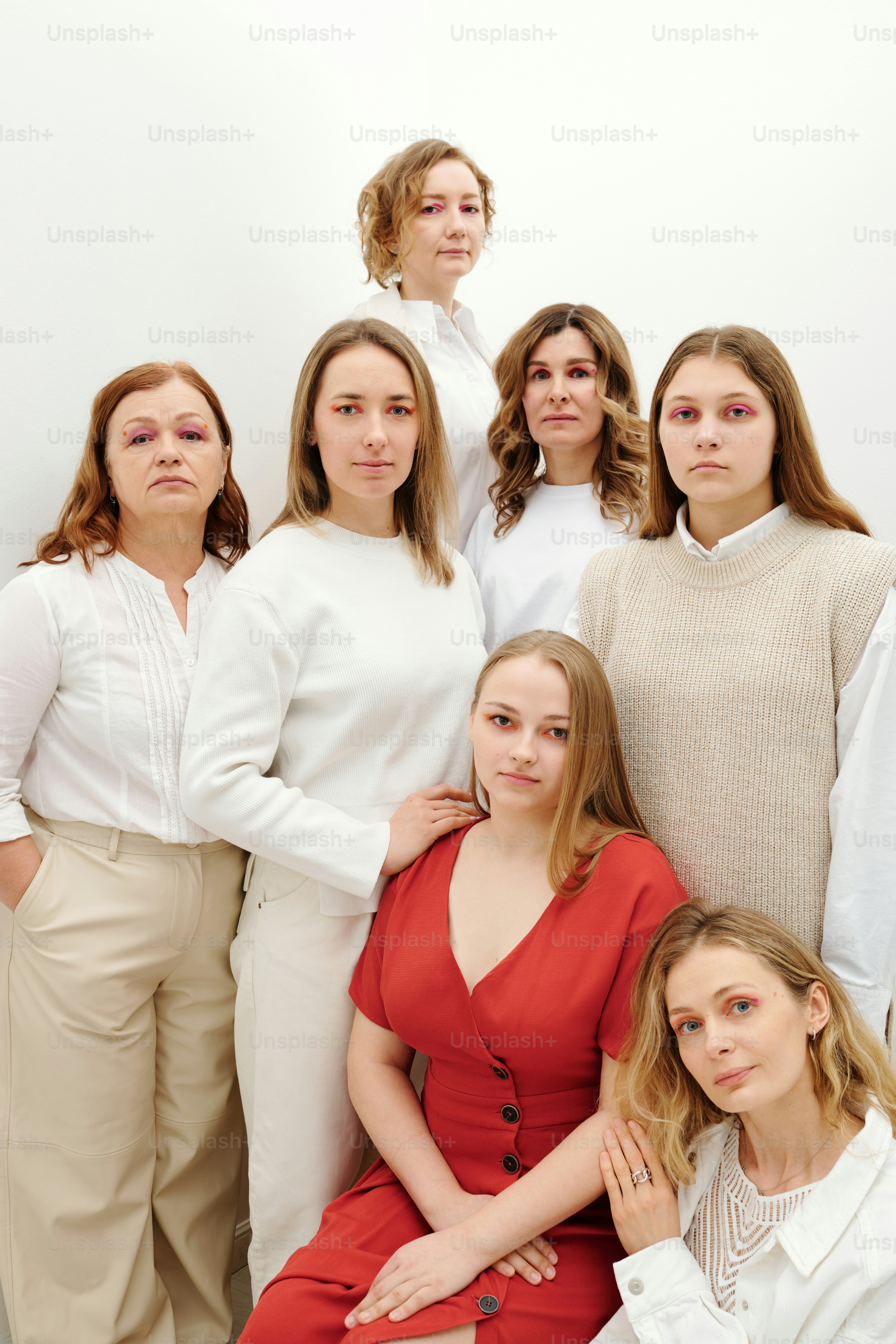 Studio portrait of a group of women of different ages and body types