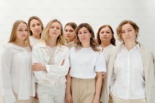 a group of women standing next to each other