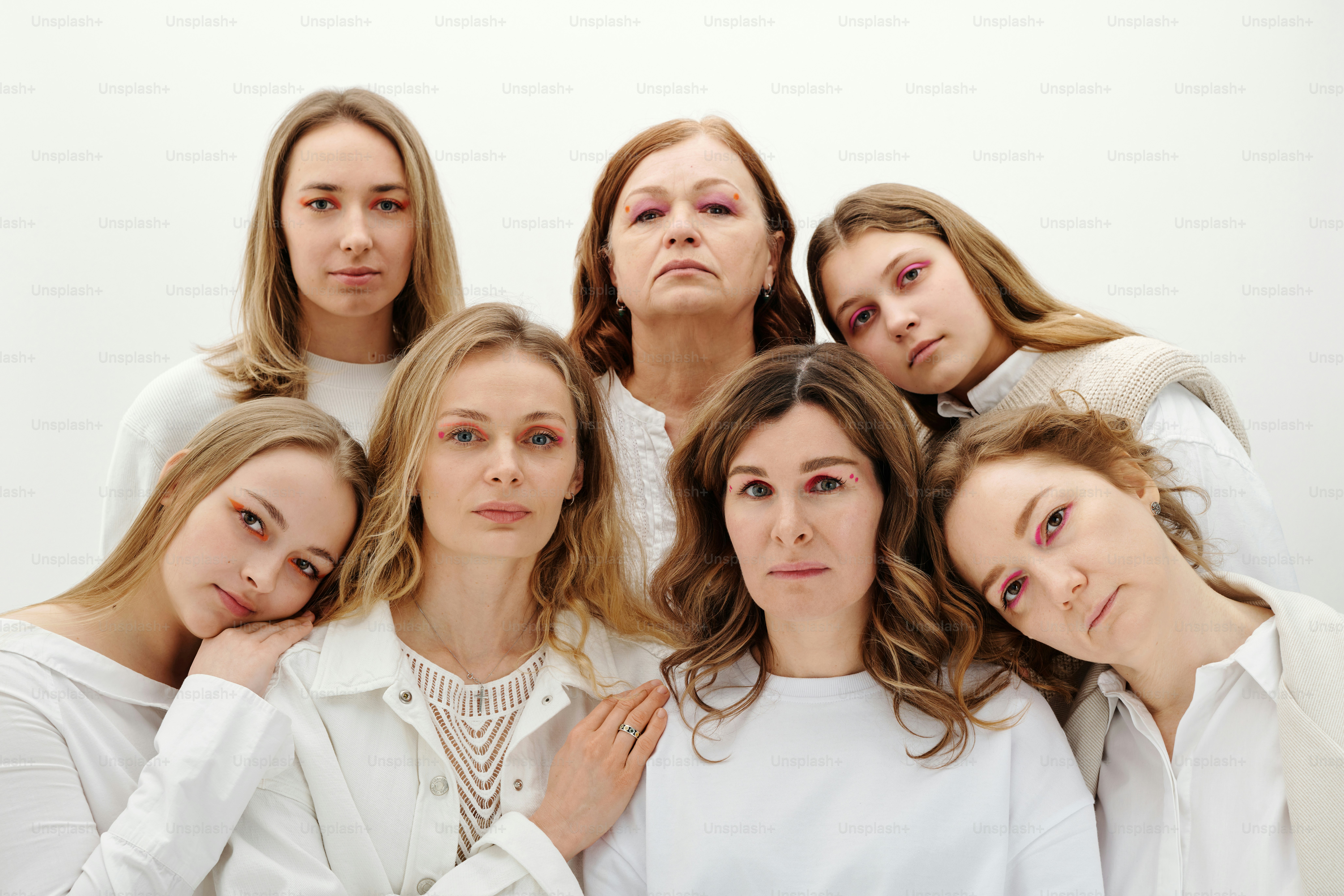 a group of women standing next to each other
