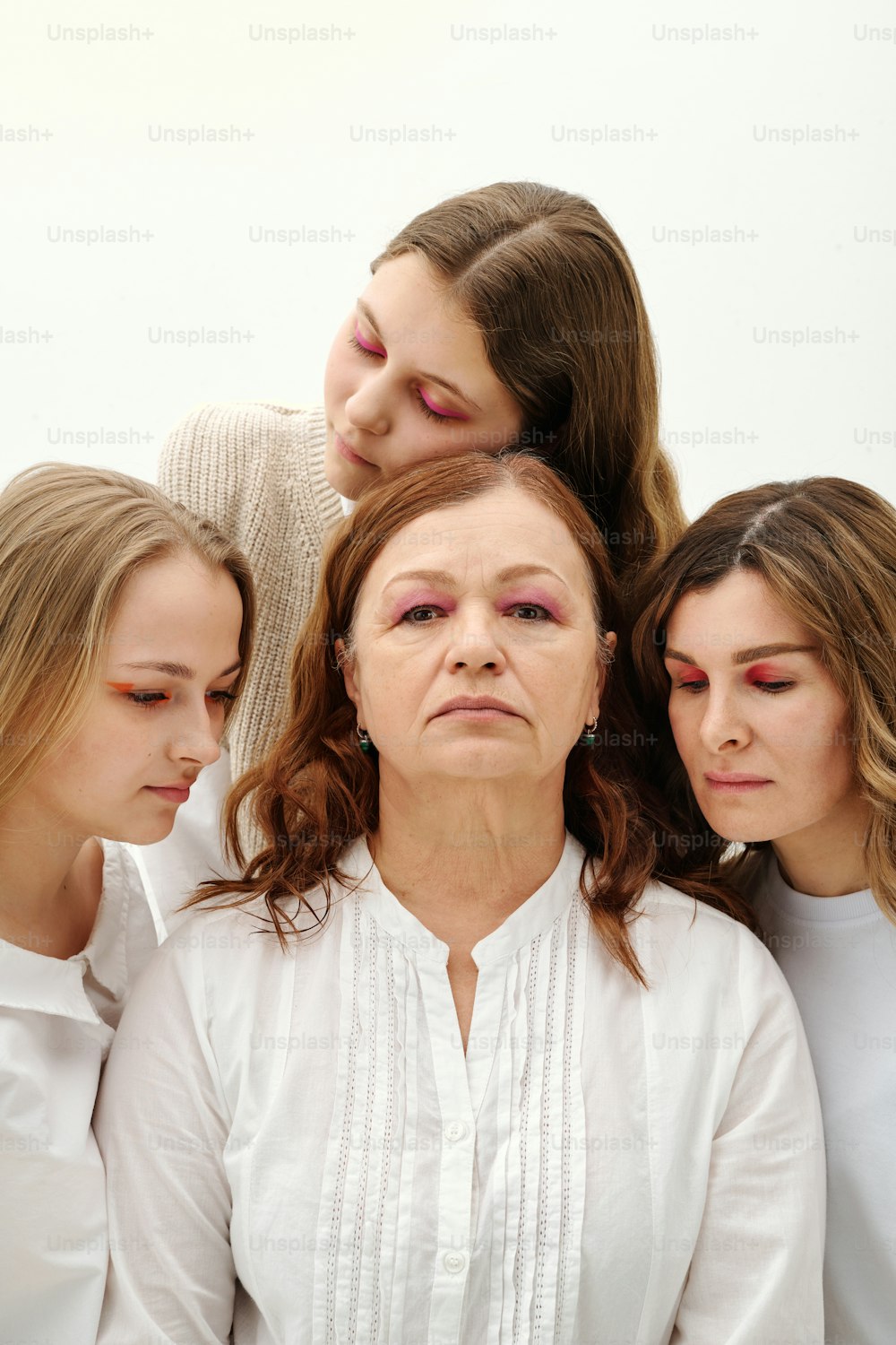 a group of women standing next to each other