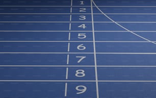 a close up of a running track with numbers on it