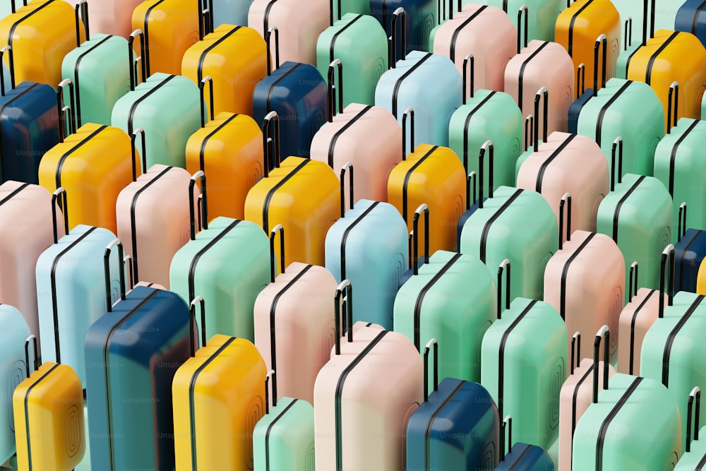 a large group of multicolored suitcases sitting side by side