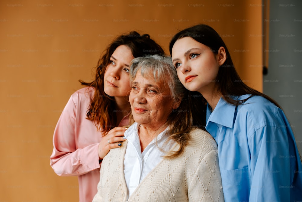 a group of women standing next to each other