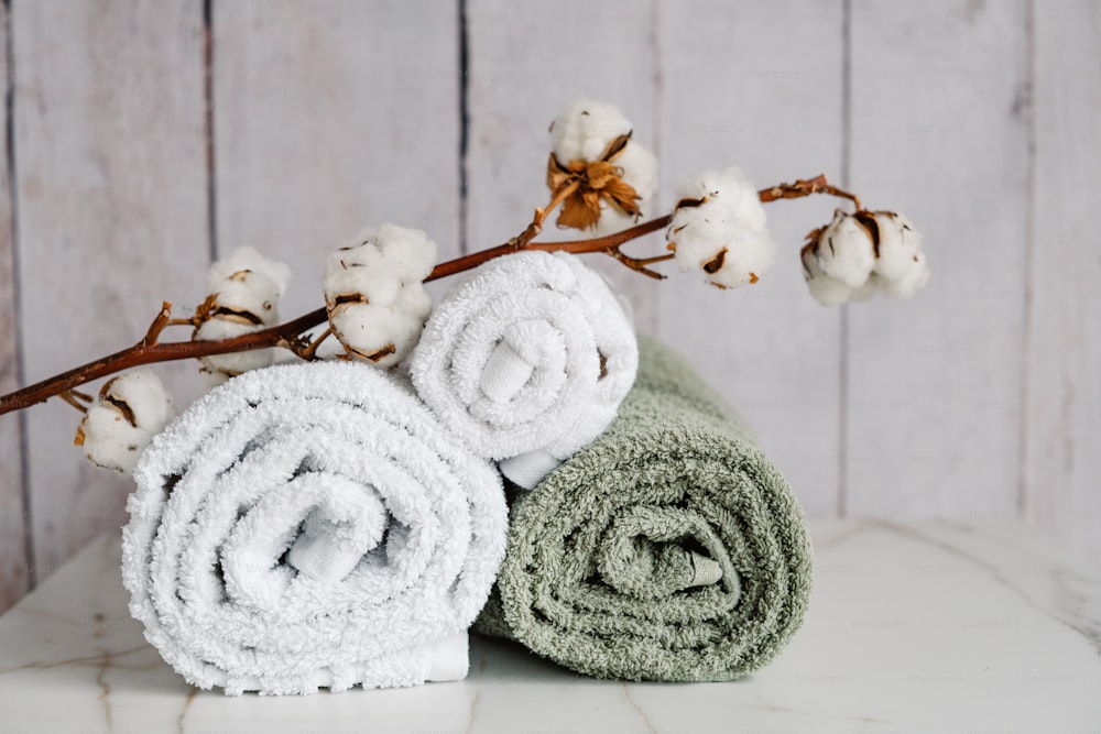 a couple of towels sitting on top of a counter