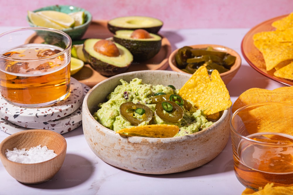 a bowl filled with guacamole and chips