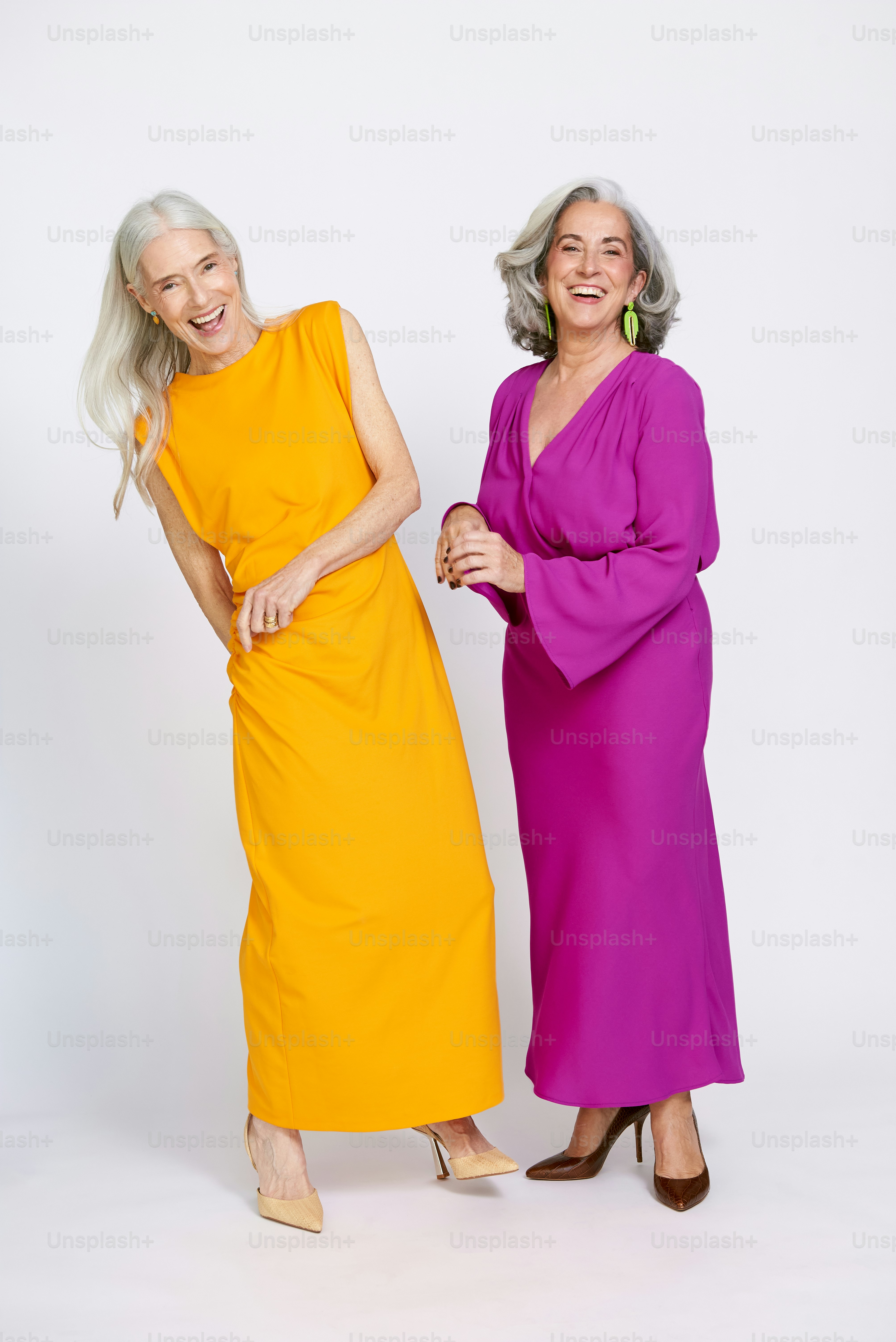 two older women standing next to each other