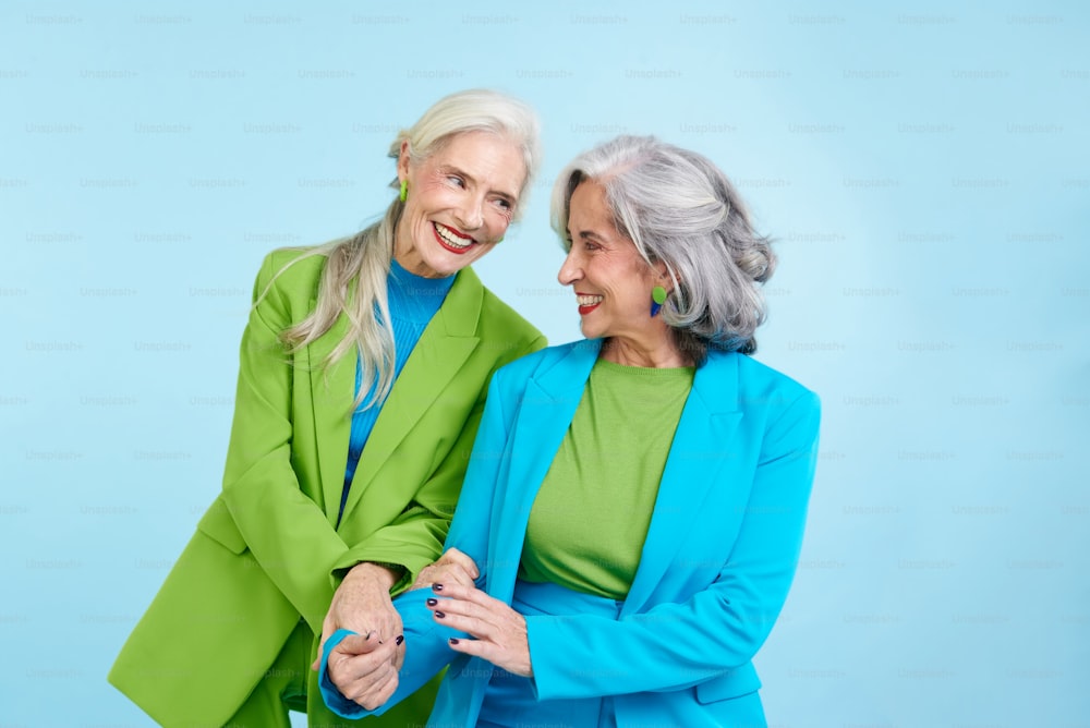 a couple of women standing next to each other