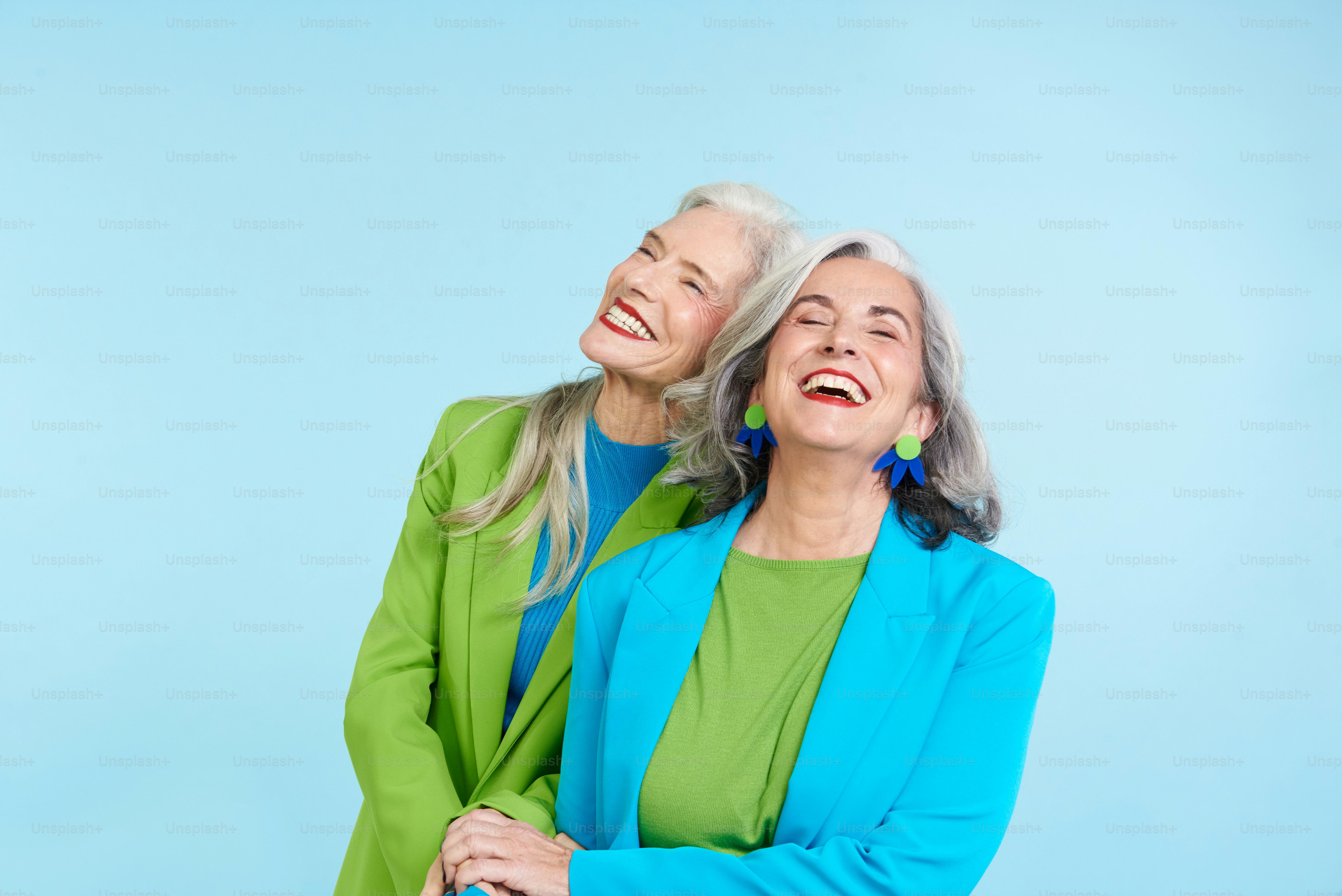 a couple of women standing next to each other