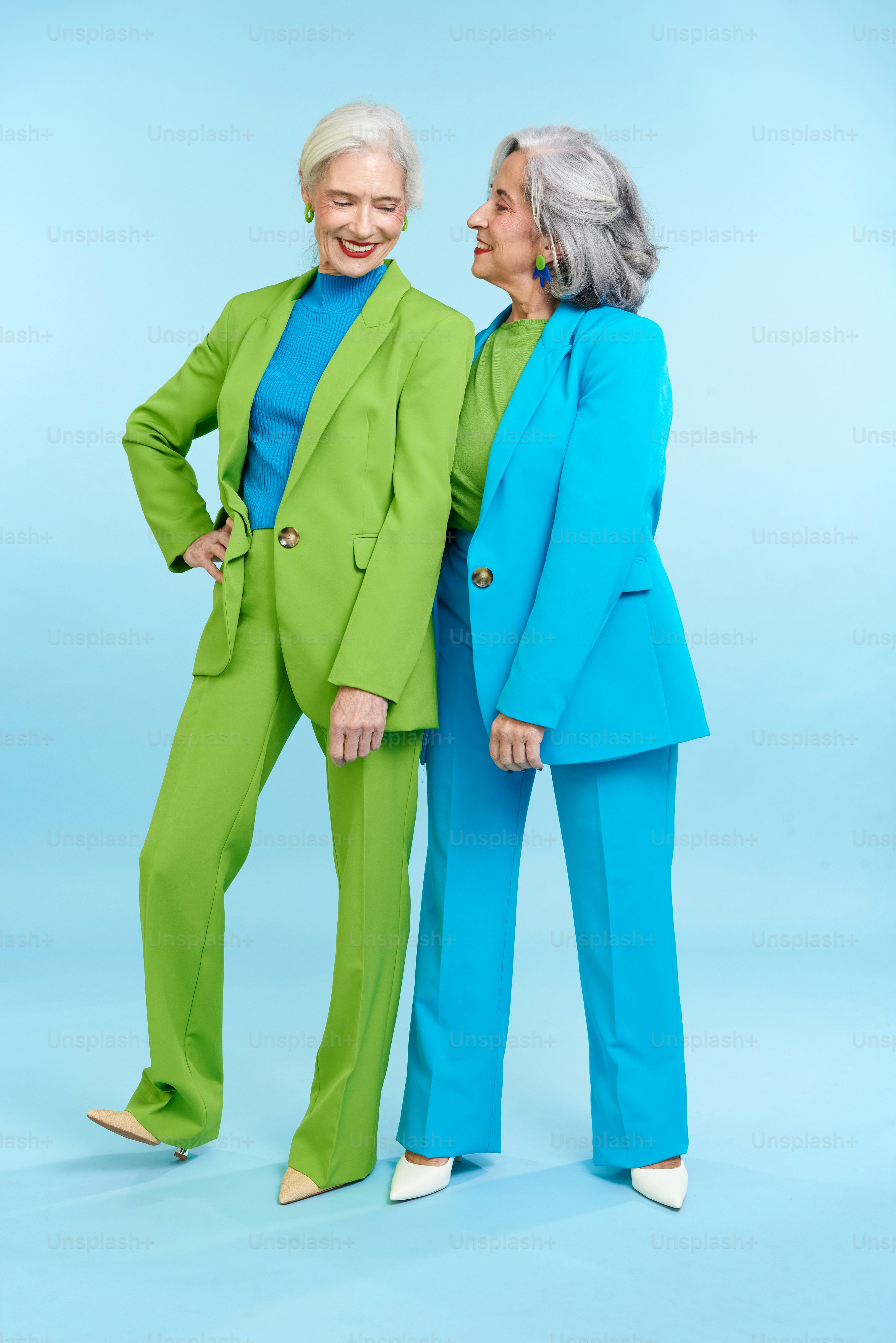 a couple of women standing next to each other