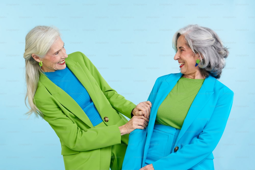 two older women standing next to each other