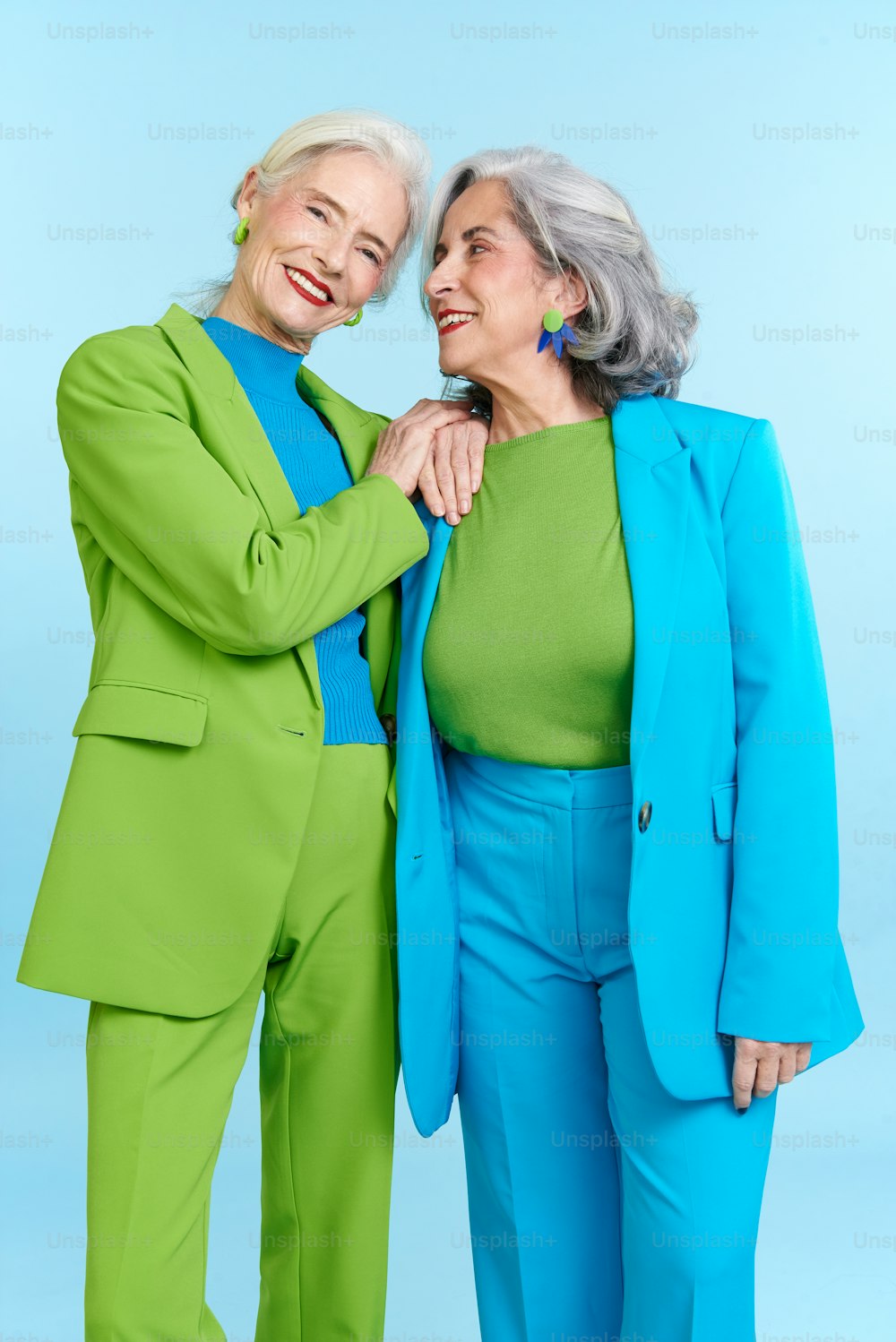 a couple of women standing next to each other