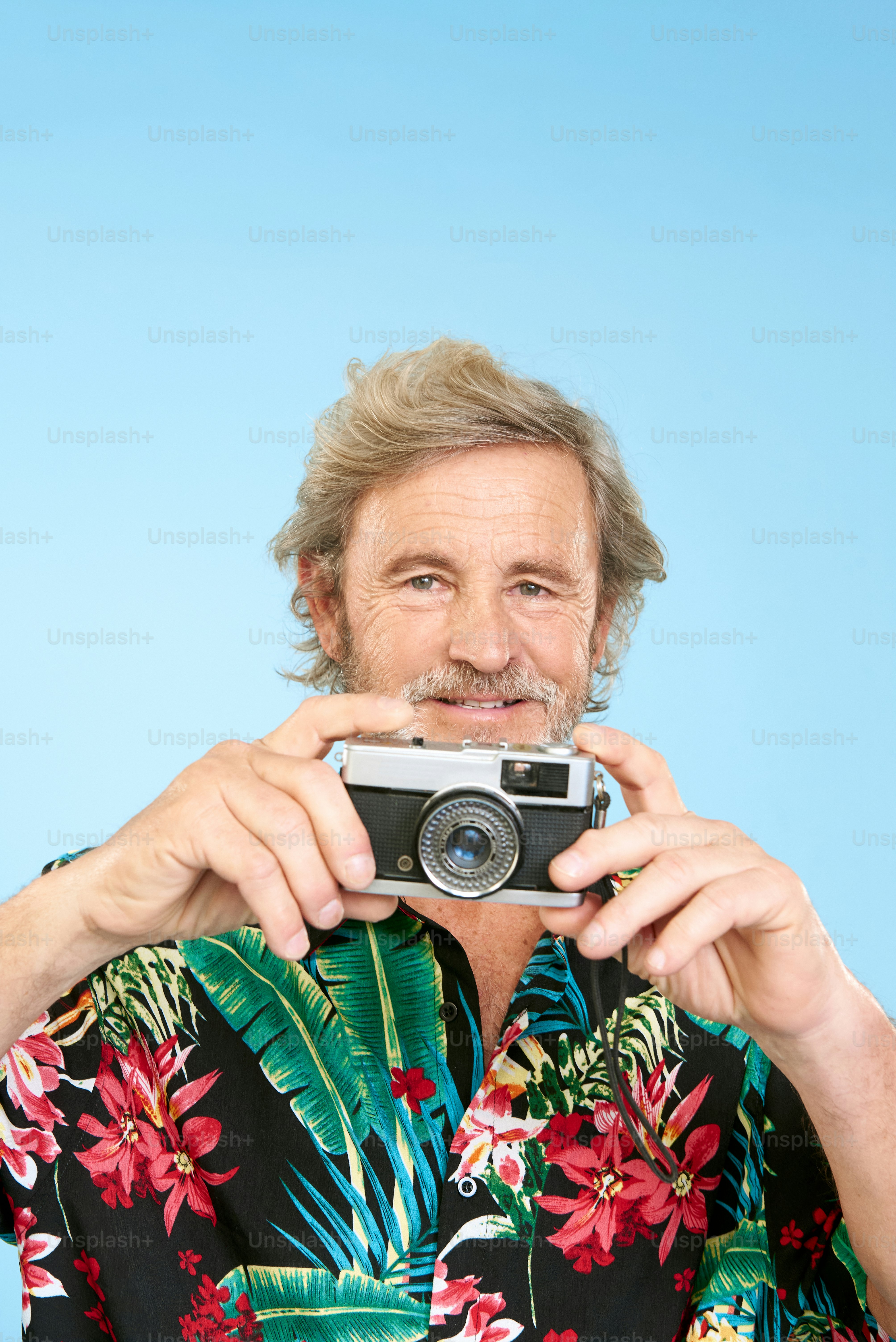 a man taking a picture of himself with a camera