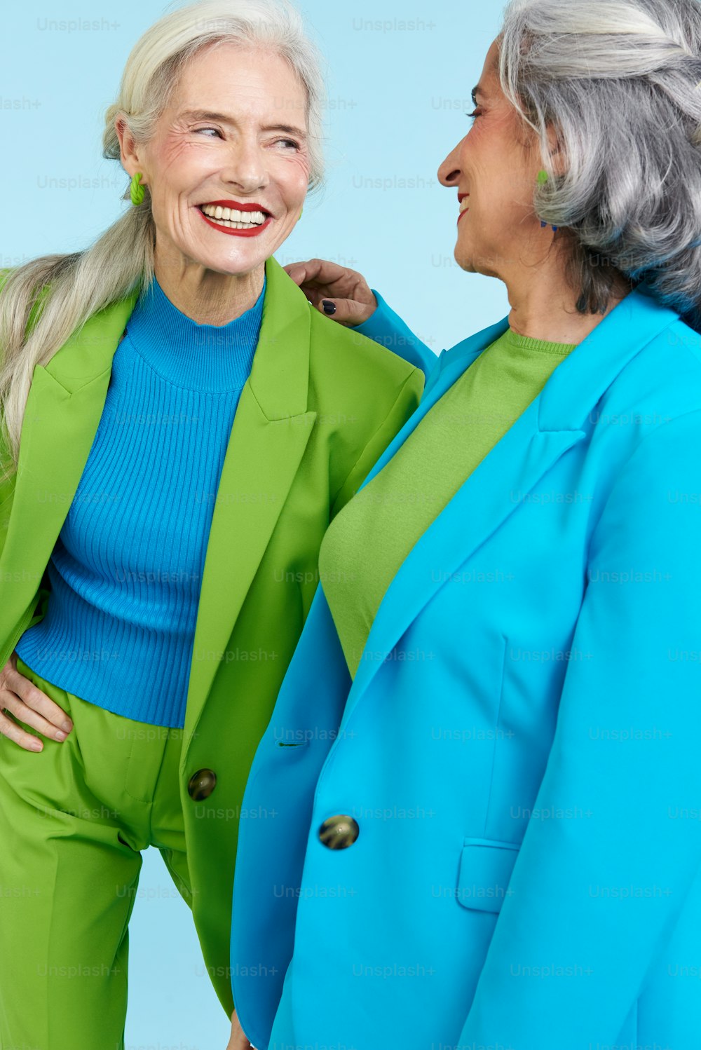 two older women standing next to each other