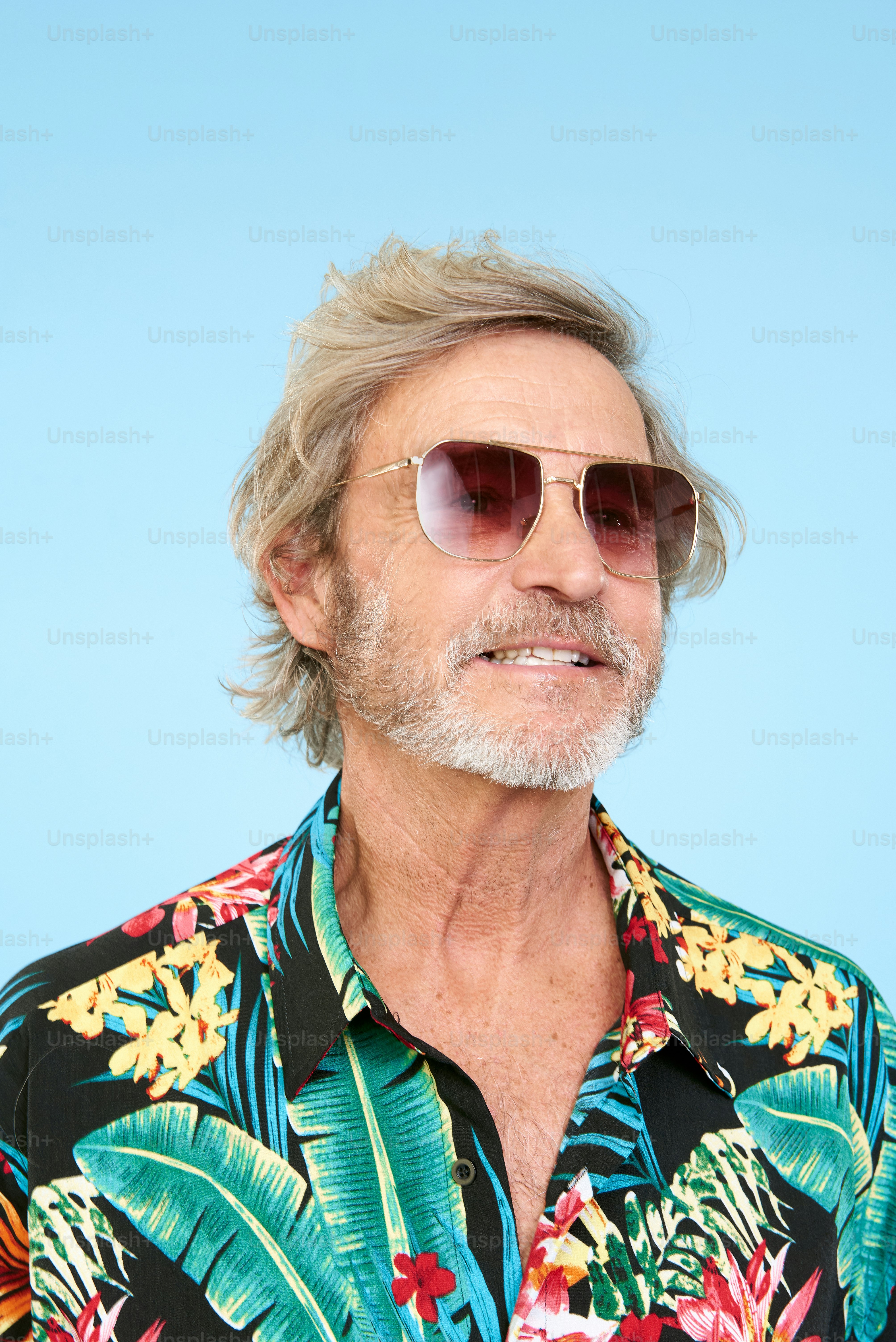 a man with a white beard wearing sunglasses