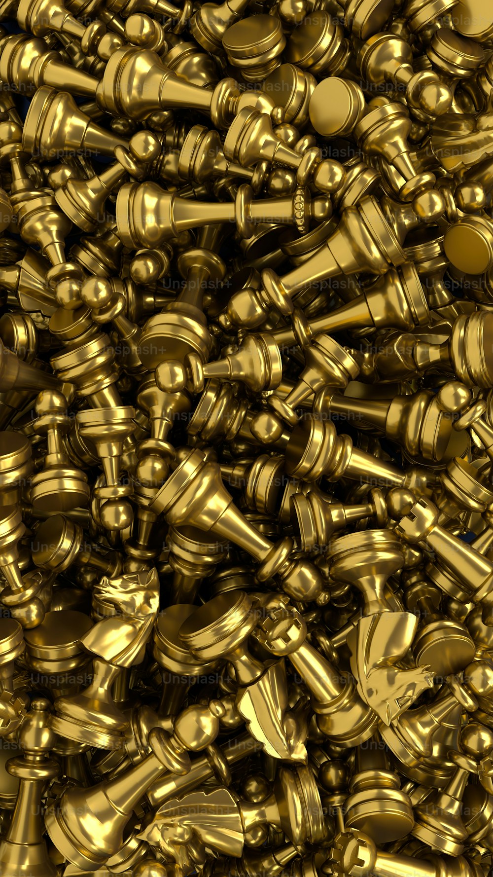 a large pile of shiny gold objects