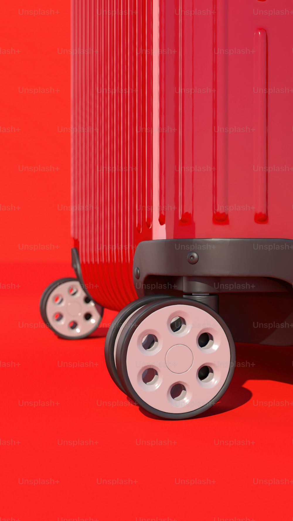 a red piece of luggage sitting on top of a red floor