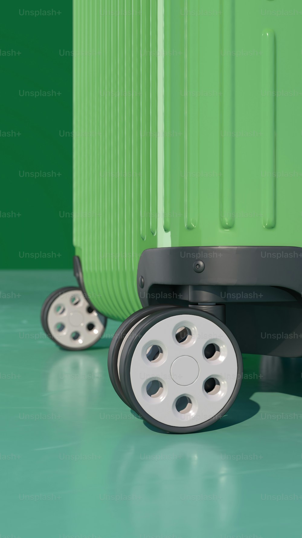 a green piece of luggage sitting on top of a green floor