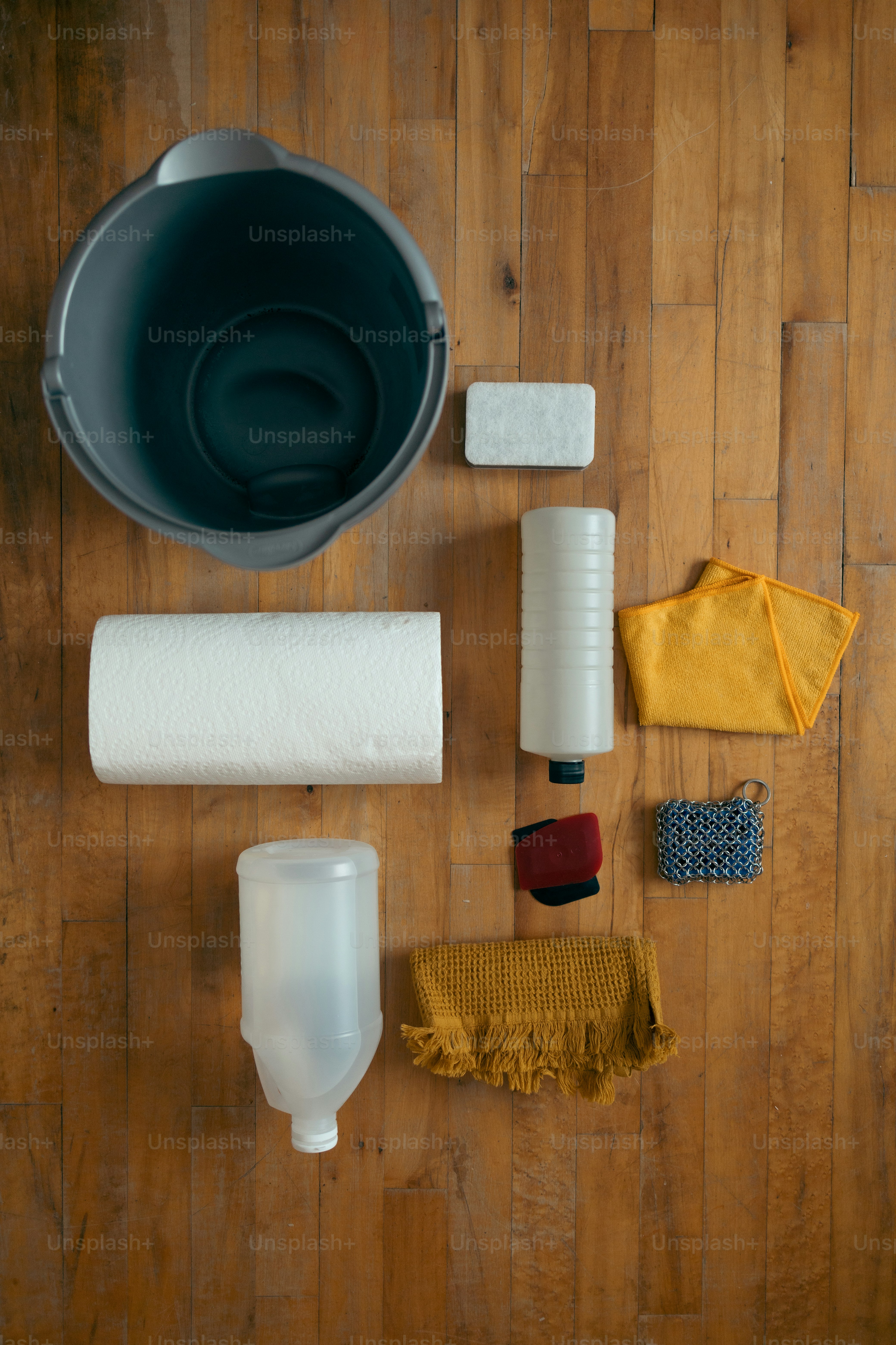 a wooden floor with various items on top of it