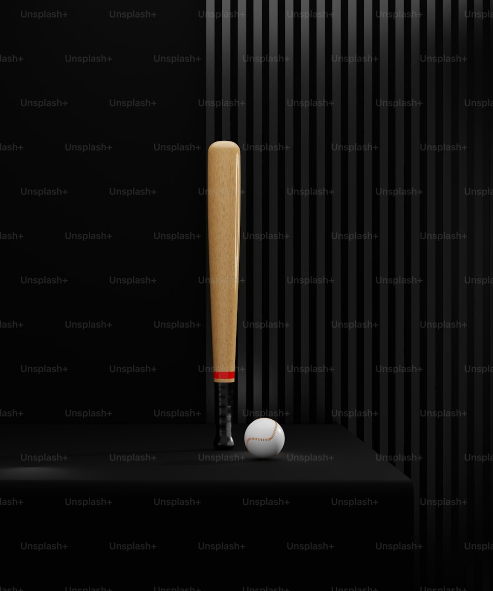 Un bate de béisbol y una pelota en un estante