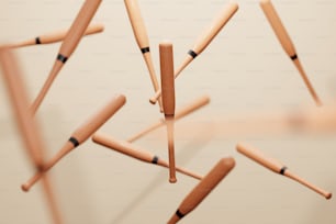 a group of wooden sticks sticking out of a wall