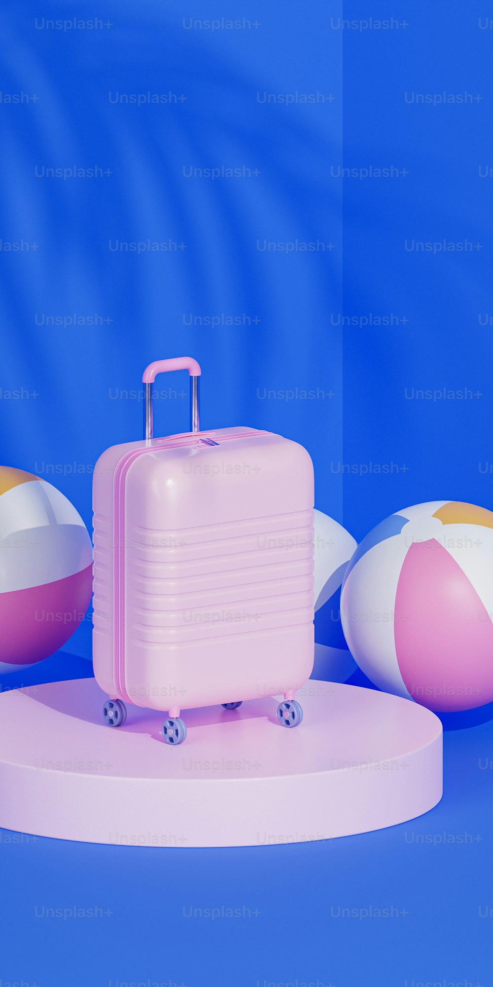 a pink suitcase and beach balls on a blue background