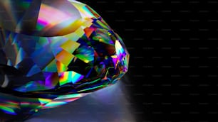 a very colorful diamond on a black background