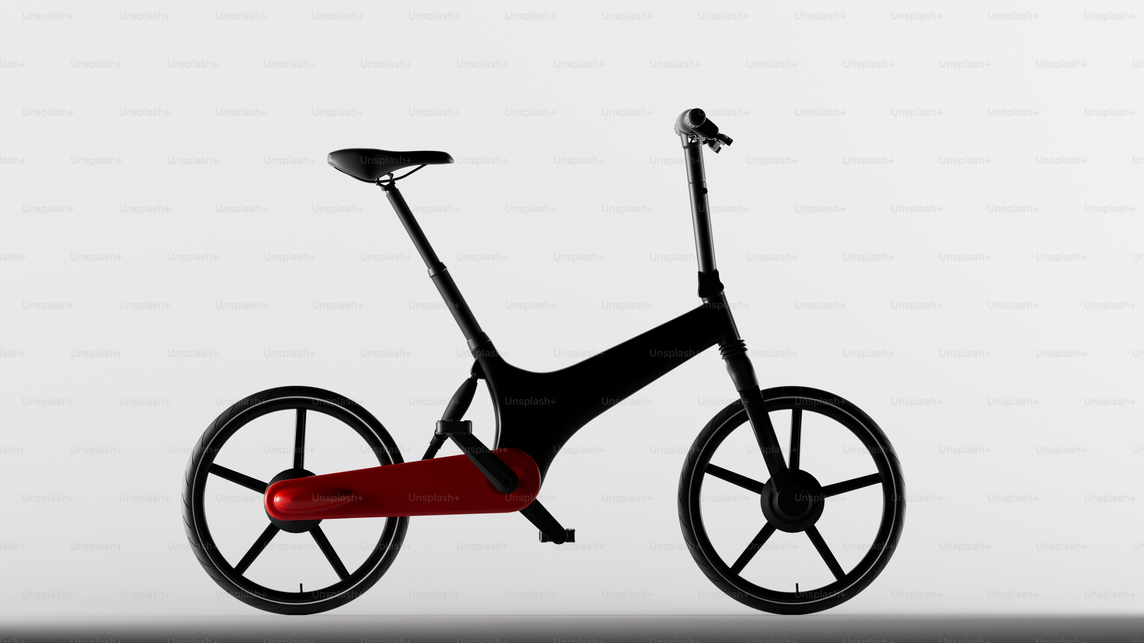 uma bicicleta preta e vermelha com um assento vermelho