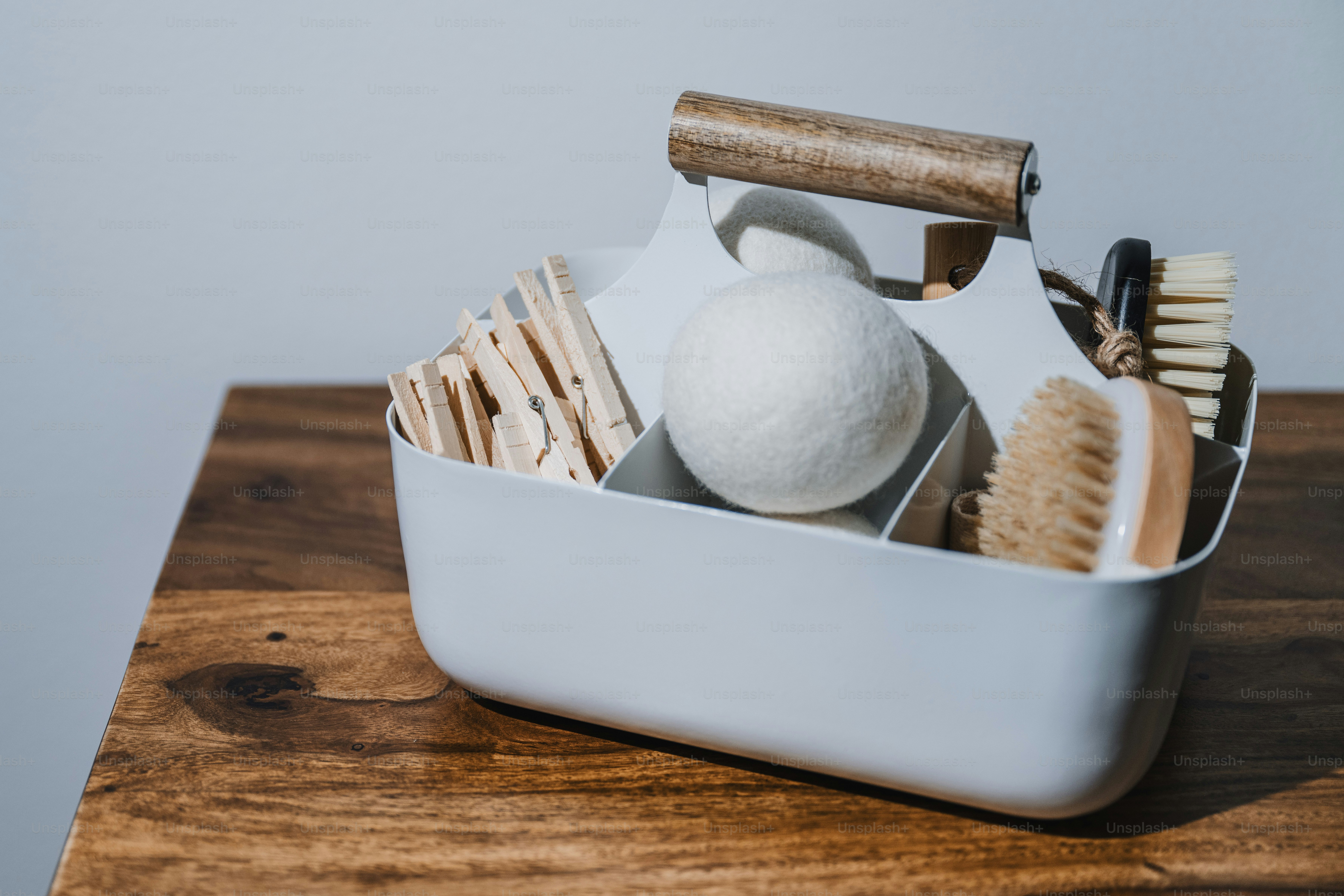 Sustainable laundry detergent products arranged in a modern eco-friendly laundry room