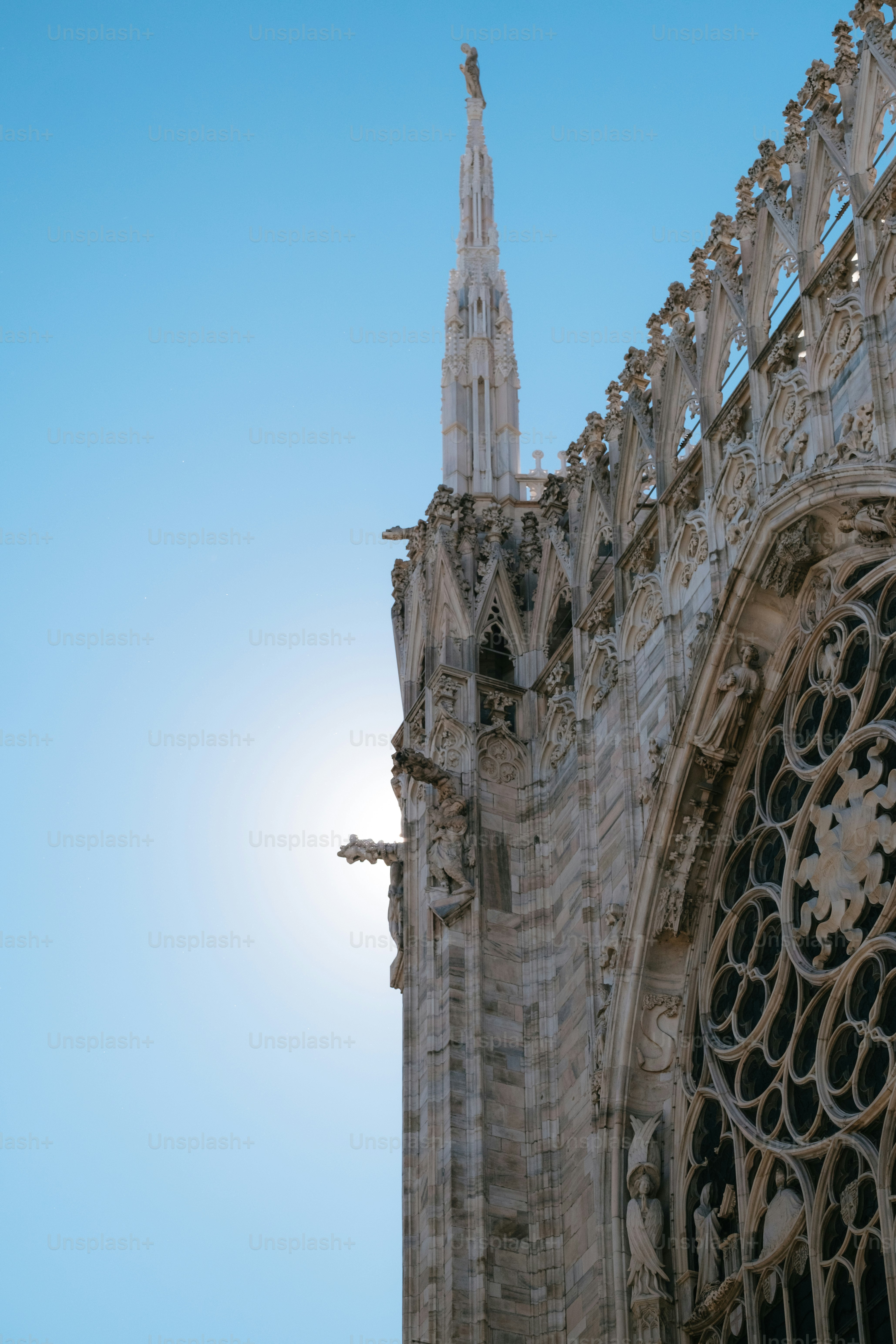 a very tall building with a clock on it's side