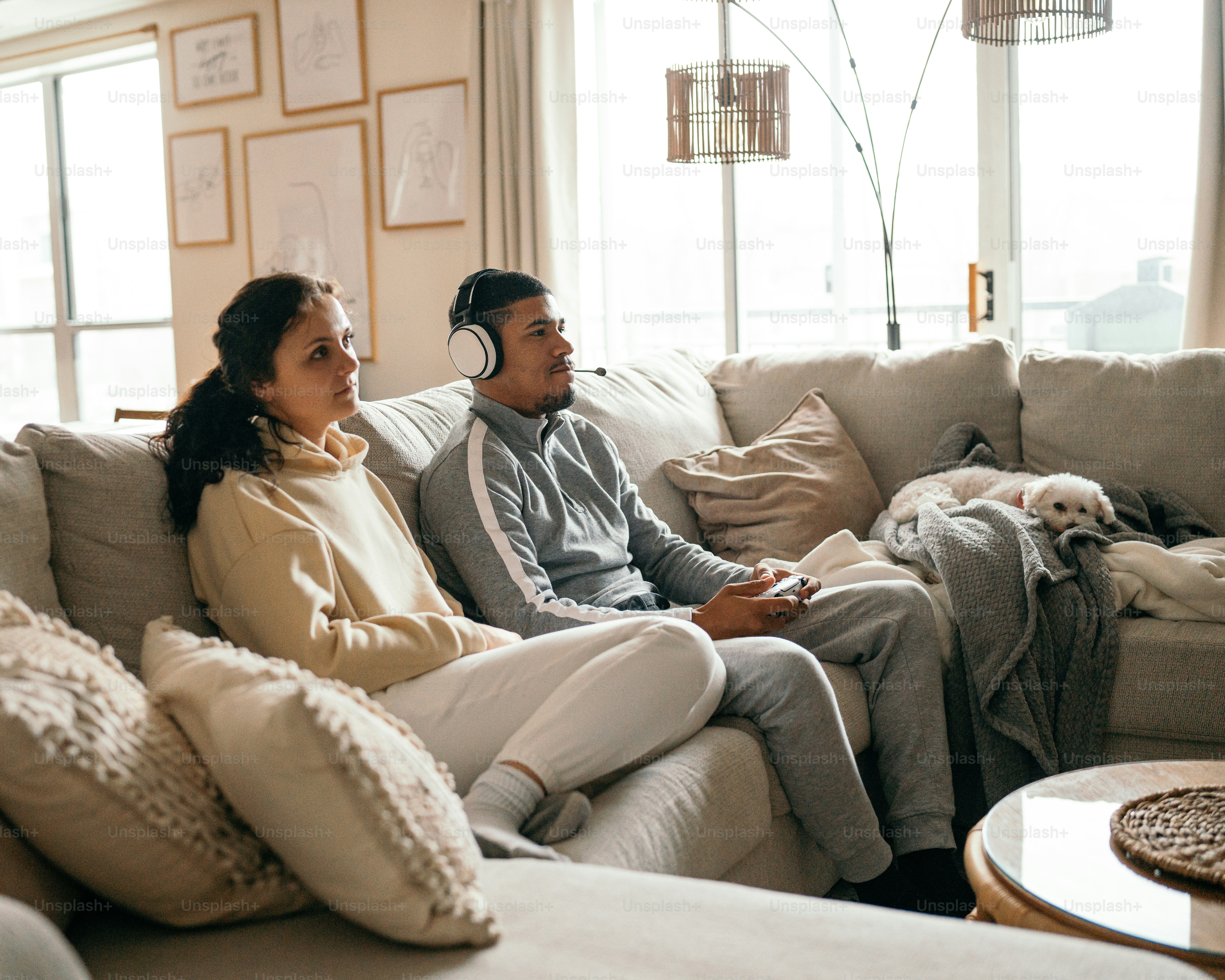 a man and a woman sitting on a couch