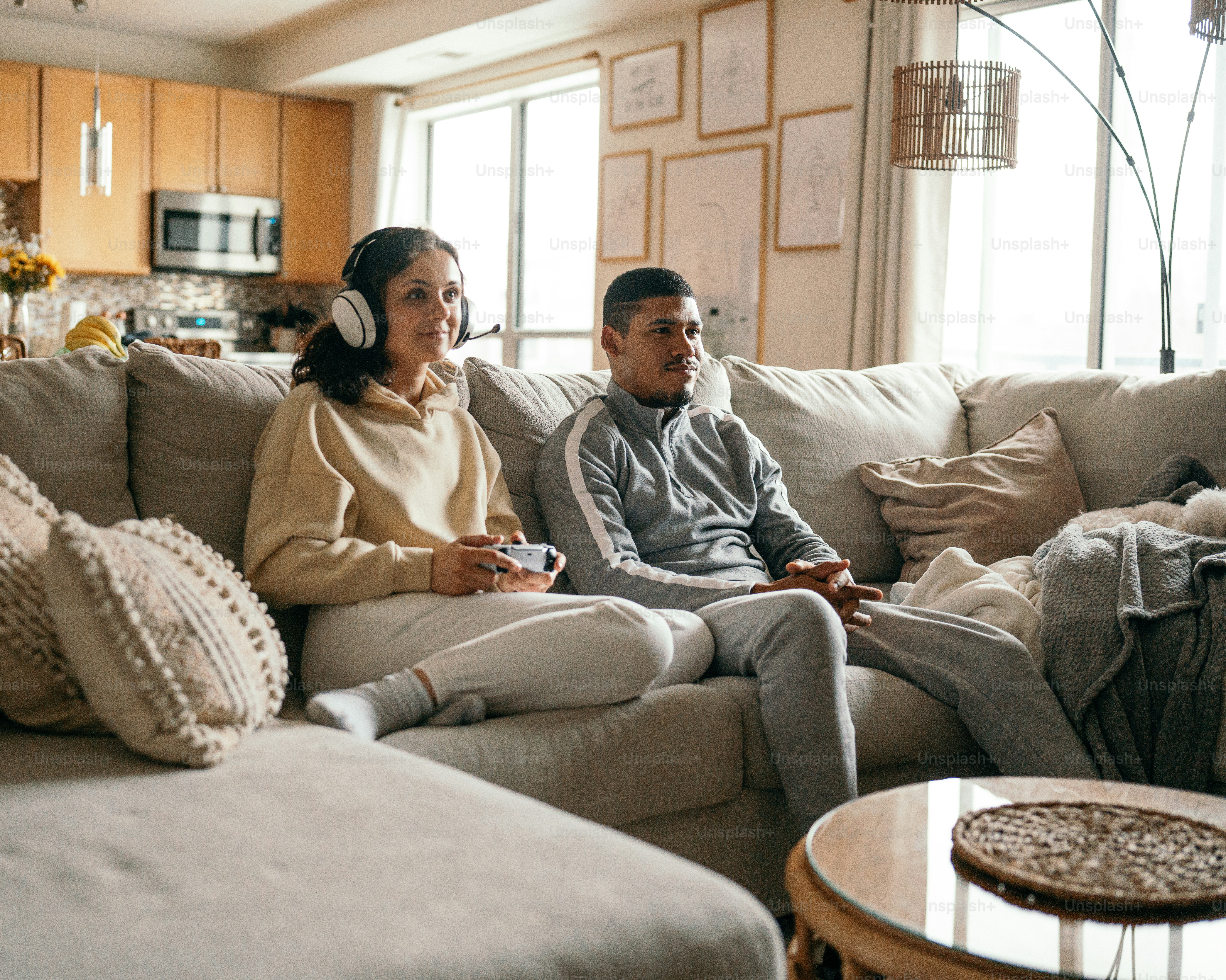 a man and a woman sitting on a couch
