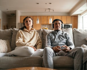 a man and a woman sitting on a couch