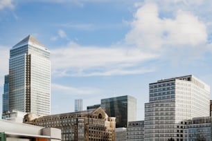 a group of tall buildings sitting next to each other