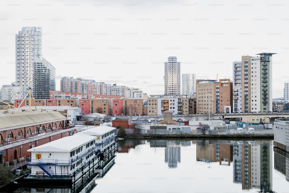 a body of water surrounded by tall buildings