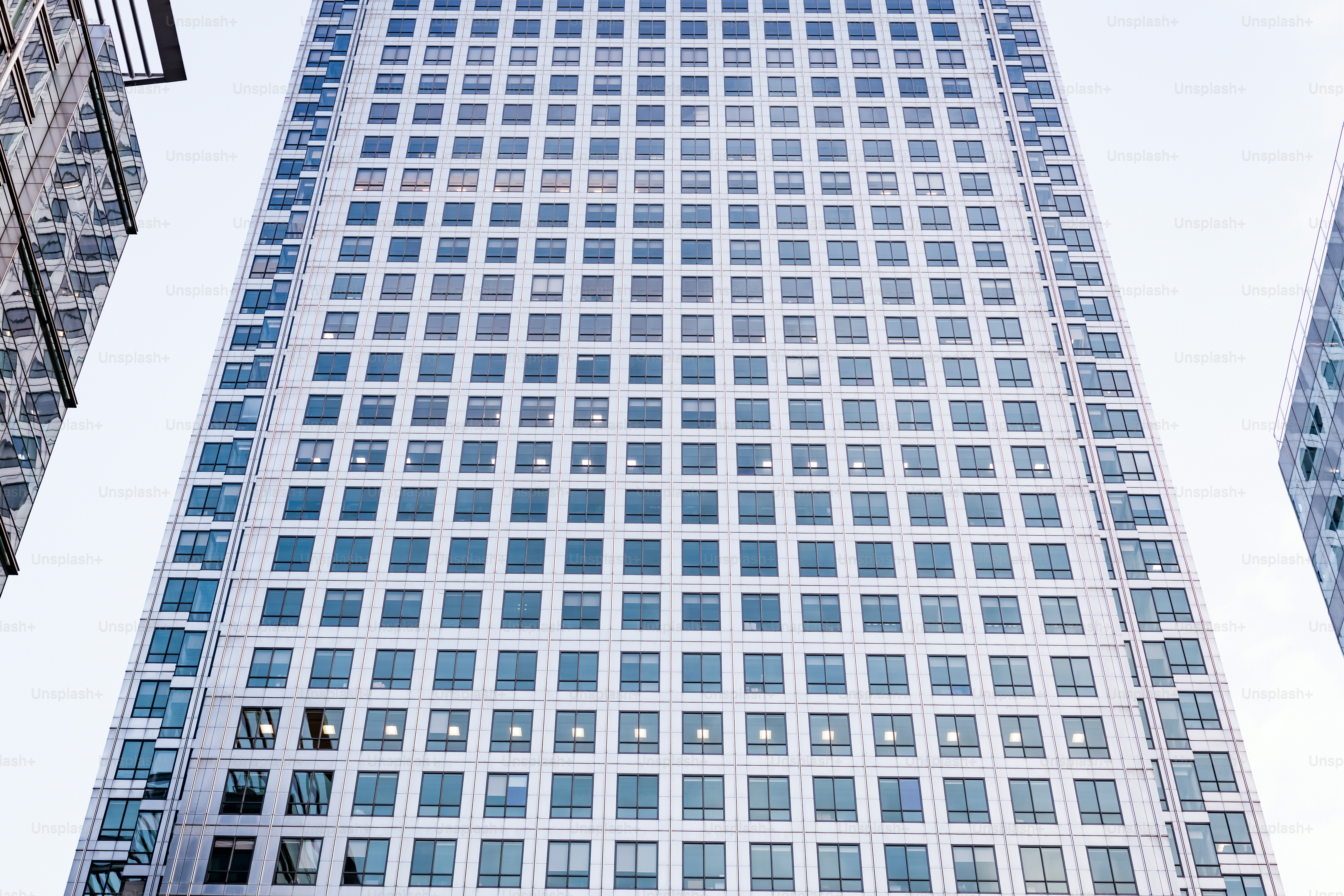 A very tall building with lots of windows photo – Architecture Image on ...