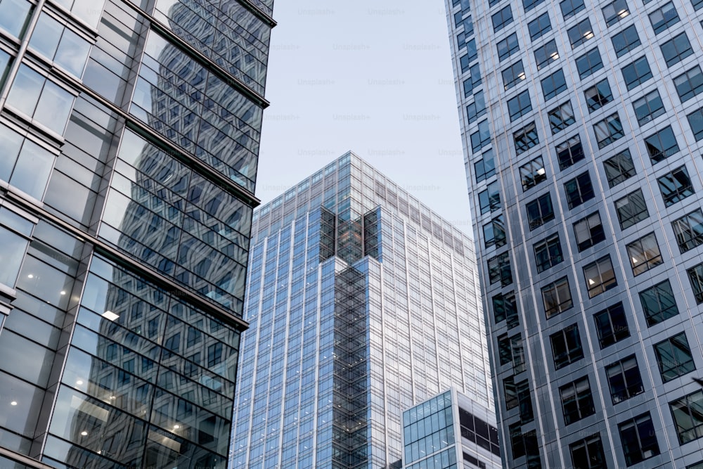 a group of tall buildings next to each other