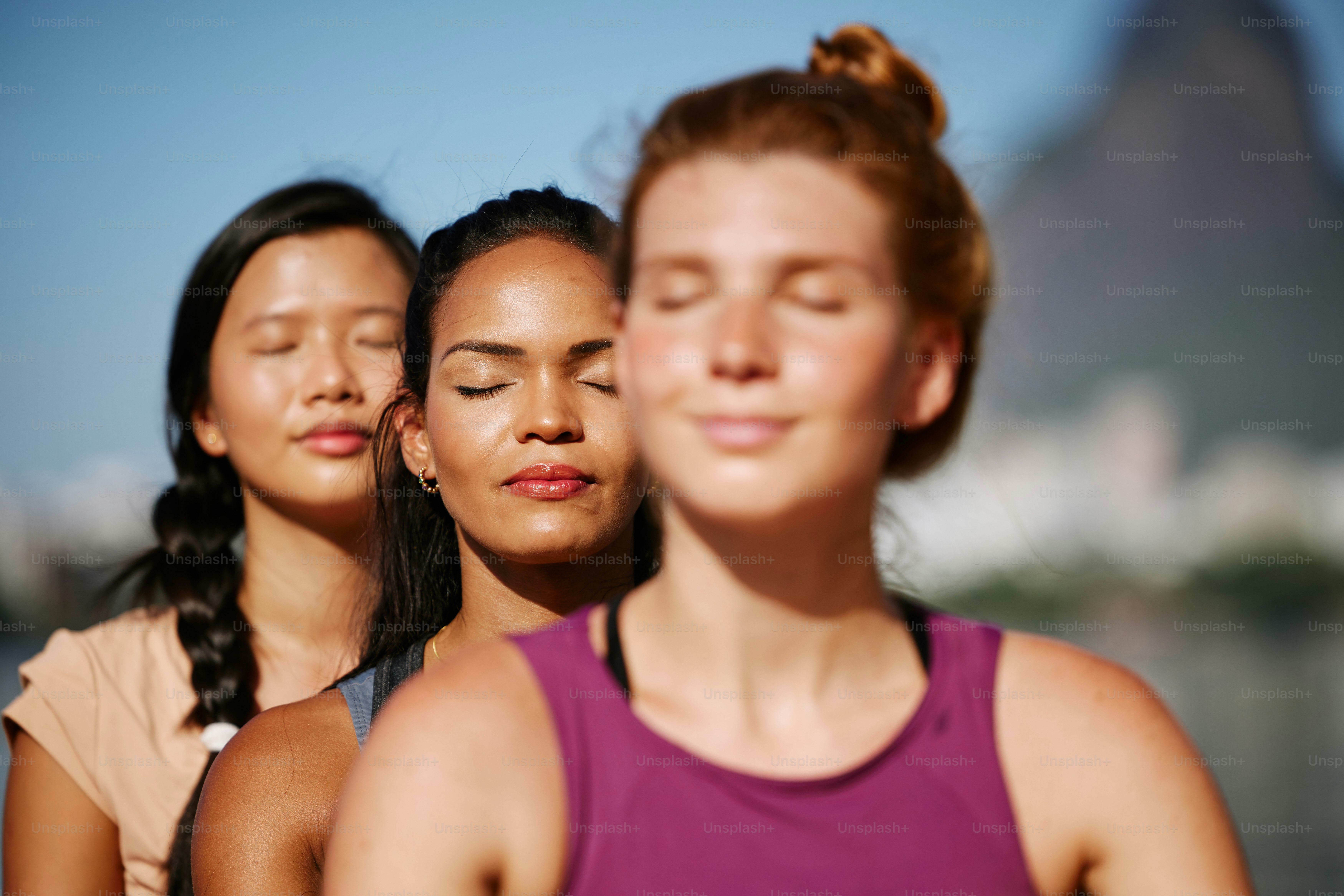 a group of women standing next to each other