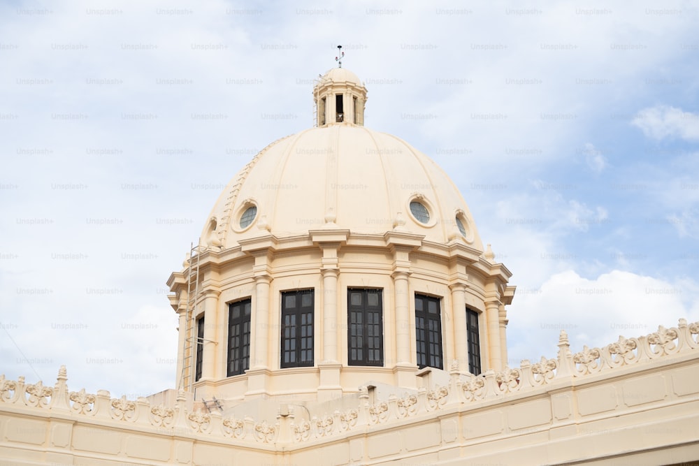 a large building with a clock on the top of it