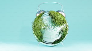 a green globe with a headphone on top of it