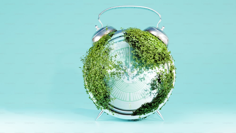 a green globe with a headphone on top of it