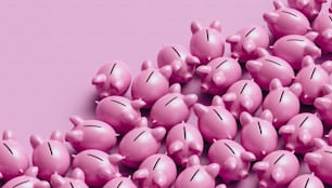 a bunch of pink piggy banks sitting next to each other