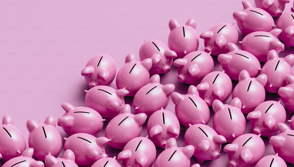 a bunch of pink piggy banks sitting next to each other