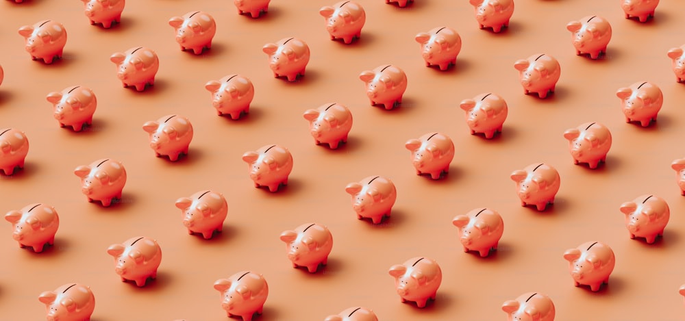 a large group of pink piggy banks on an orange background