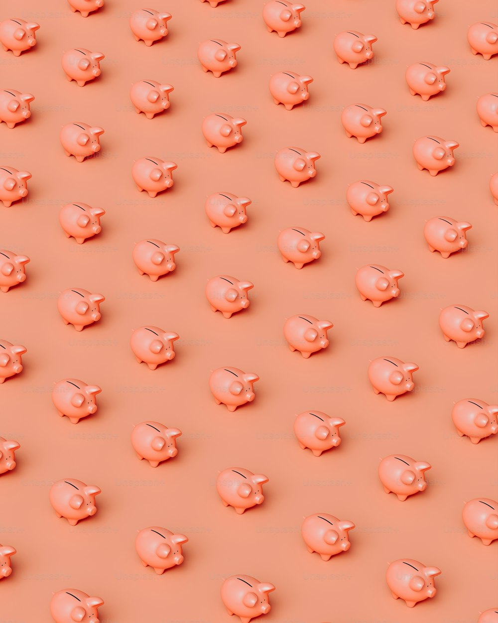 a large group of little pink elephants on a pink background