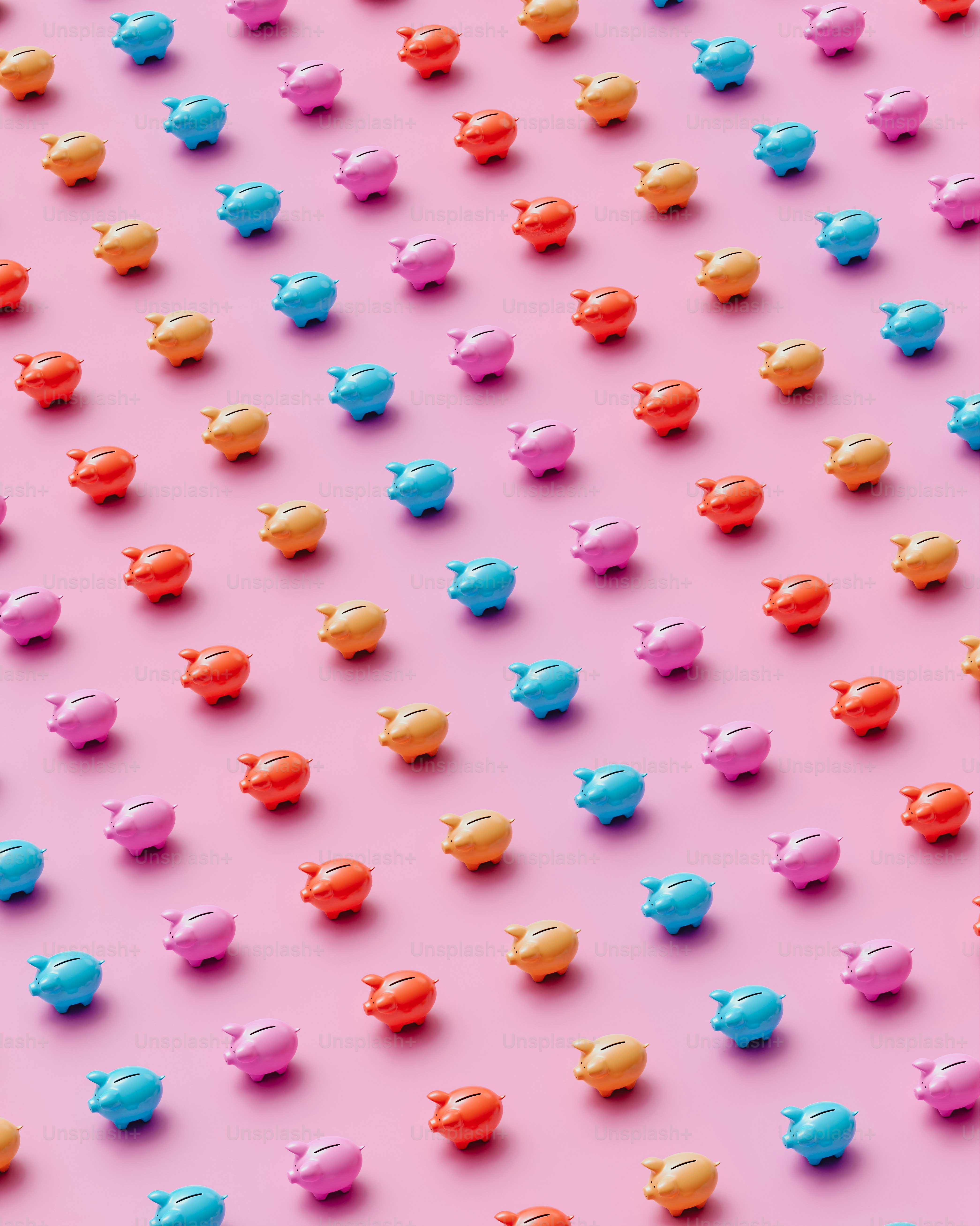 a pink background with small blue and red elephants