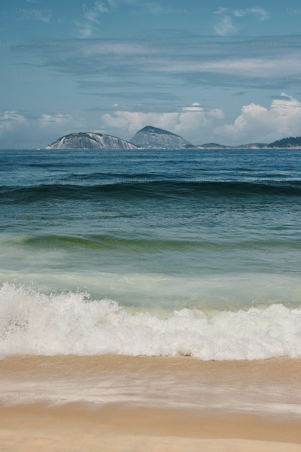 a person riding a surfboard on top of a wave