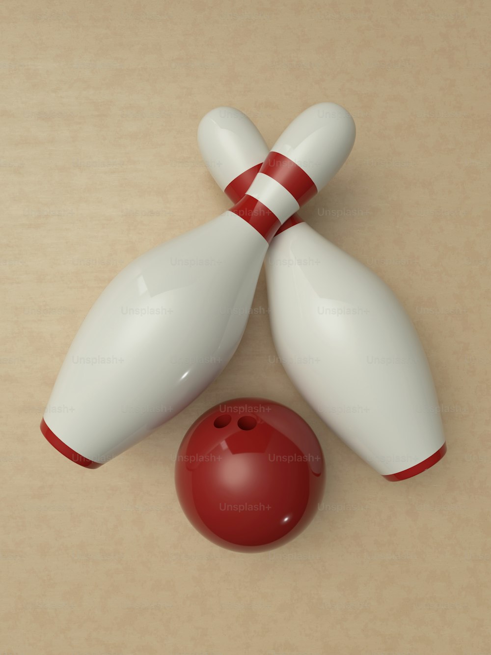 a white bowling ball and a red bowling pin