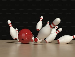 une boule de bowling s’écrasant dans les quilles d’une boule de bowling